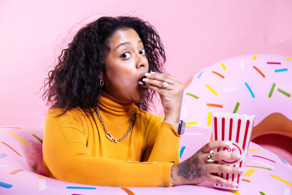 Dish Me Co-host ChattyMuva eats popcorn.